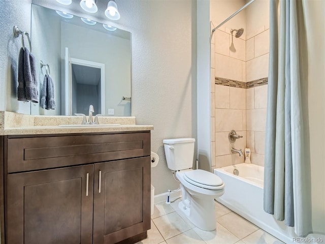 full bath featuring vanity, shower / tub combo, tile patterned flooring, and toilet