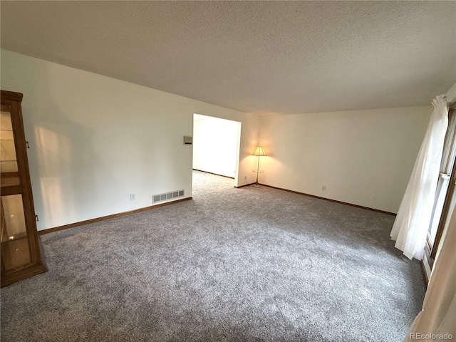 3262 S Salida Way, Aurora, CO 80013 - carpeted empty room featuring a textured ceiling