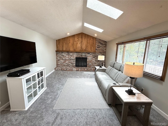 3262 S Salida Way, Aurora, CO 80013 - carpeted living room with a skylight, vaulted ceiling, a fireplace, and a textured ceiling
