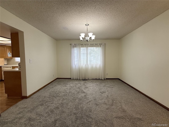 3262 S Salida Way, Aurora, CO 80013 - unfurnished room with carpet flooring, a chandelier, and a textured ceiling