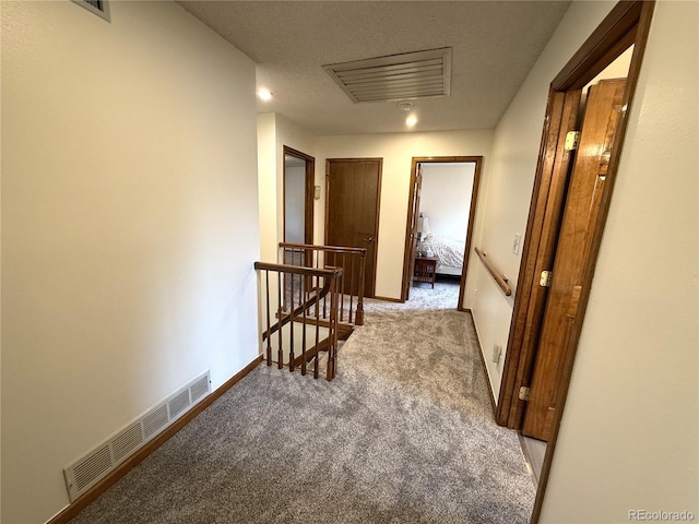 3262 S Salida Way, Aurora, CO 80013 - hall featuring an upstairs landing, light colored carpet, and attic access