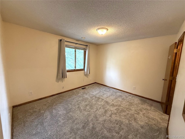 3262 S Salida Way, Aurora, CO 80013 - carpeted empty room featuring a textured ceiling