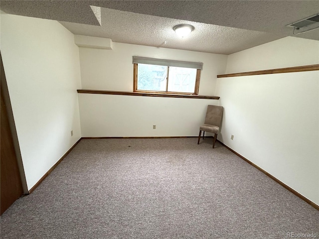 3262 S Salida Way, Aurora, CO 80013 - unfurnished room featuring carpet floors and a textured ceiling