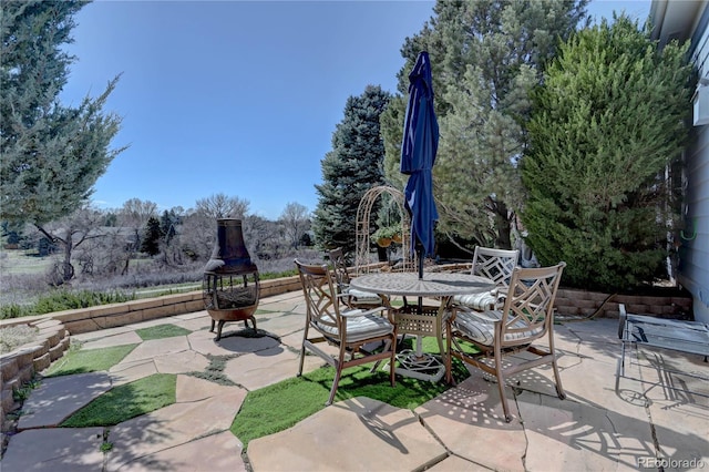 view of patio featuring outdoor dining space