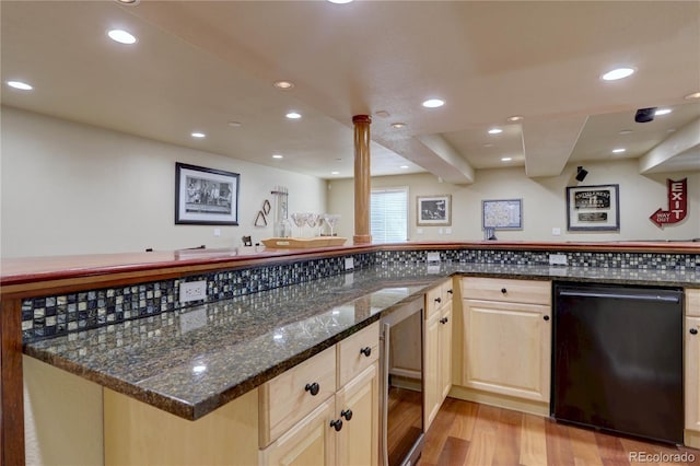 kitchen featuring wine cooler, light wood finished floors, black dishwasher, and light brown cabinetry