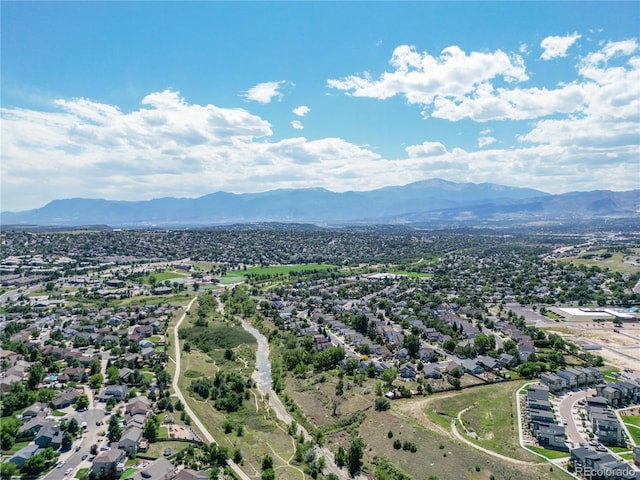 drone / aerial view featuring a mountain view