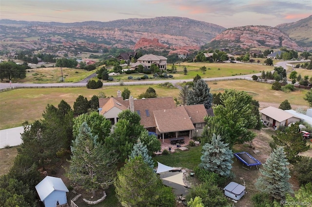 aerial view at dusk with a mountain view