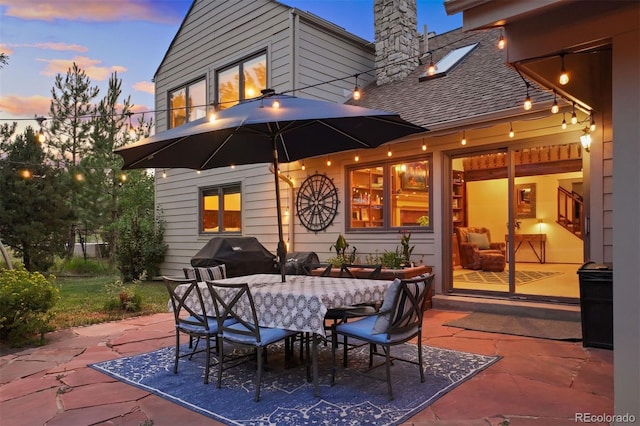 patio terrace at dusk with grilling area