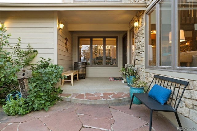 entrance to property with a patio area