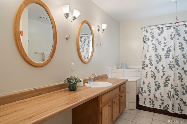 bathroom with tile patterned flooring and vanity