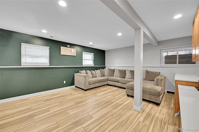 1922 Danube Way, Aurora, CO 80011 - living area with light wood finished floors and recessed lighting