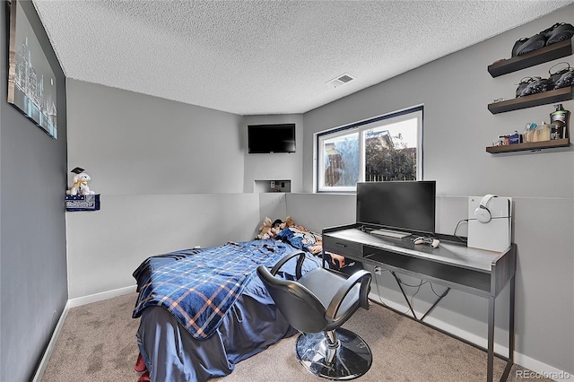 1922 Danube Way, Aurora, CO 80011 - carpeted bedroom featuring a textured ceiling and baseboards