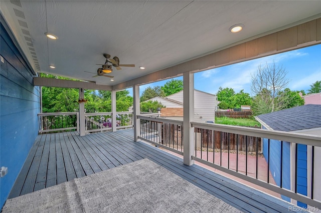 1922 Danube Way, Aurora, CO 80011 - wooden terrace featuring a ceiling fan