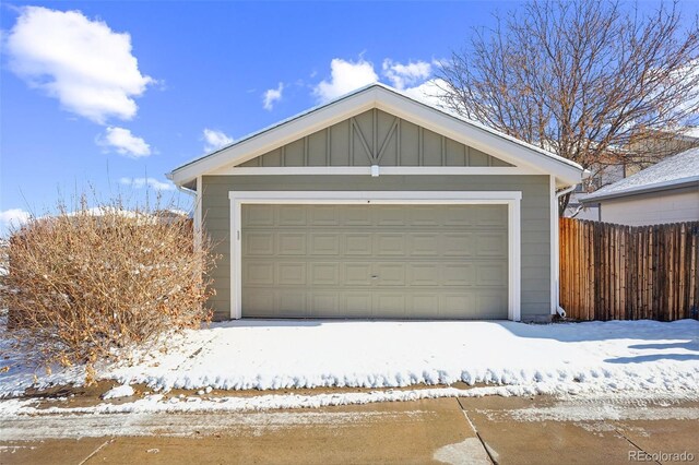 view of snow covered garage