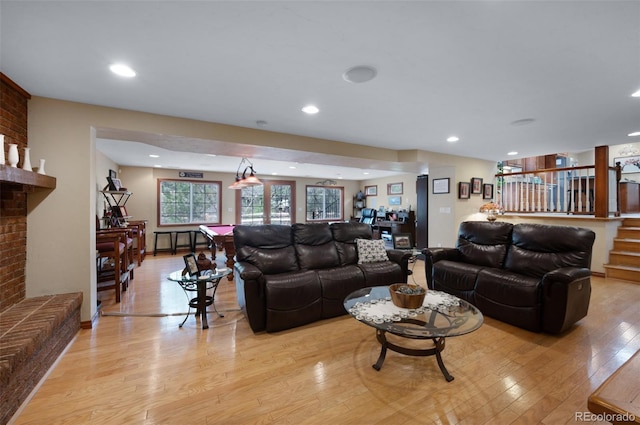 6535 Arequa Ridge Ln, Colorado Springs, CO 80919 - living room with recessed lighting and light wood finished floors