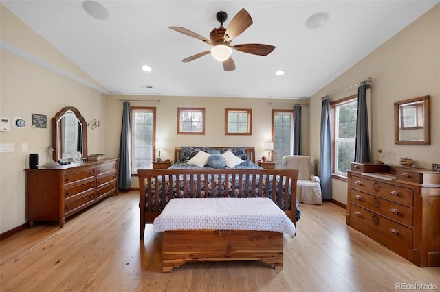 6535 Arequa Ridge Ln, Colorado Springs, CO 80919 - bedroom with baseboards, multiple windows, light wood-style flooring, and lofted ceiling