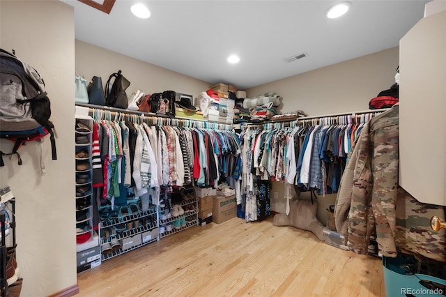 6535 Arequa Ridge Ln, Colorado Springs, CO 80919 - spacious closet with wood finished floors and visible vents