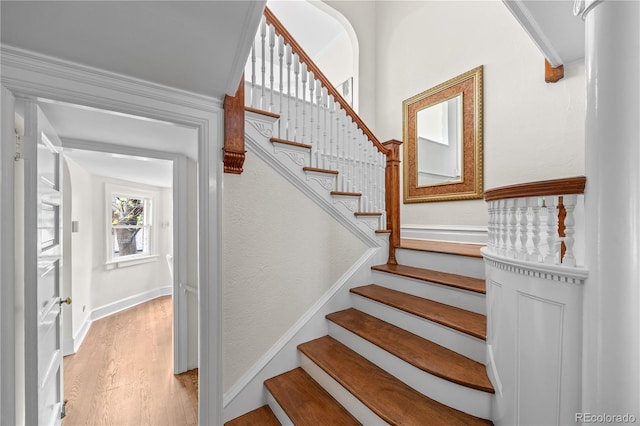 963 N Lafayette St, Denver, CO 80218 - stairway with wood finished floors and baseboards