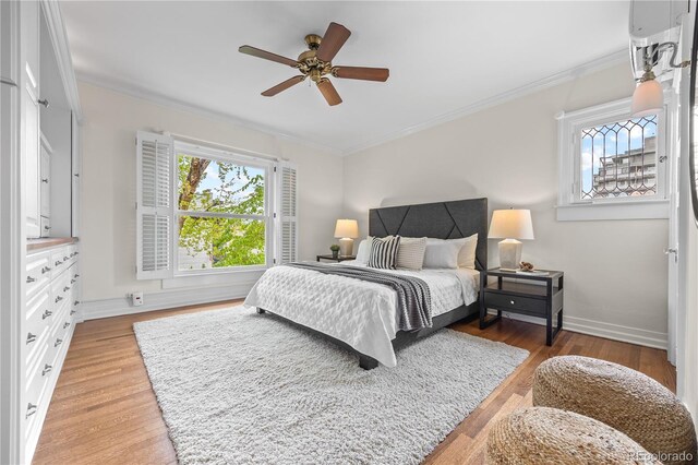 963 N Lafayette St, Denver, CO 80218 - bedroom featuring light wood finished floors, ornamental molding, baseboards, and ceiling fan