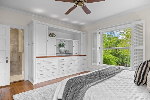963 N Lafayette St, Denver, CO 80218 - bedroom with wood finished floors, ensuite bathroom, ornamental molding, and ceiling fan