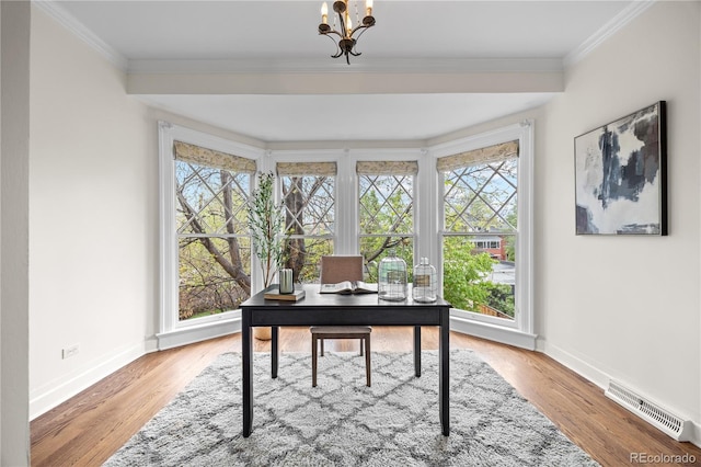 963 N Lafayette St, Denver, CO 80218 - home office featuring healthy amount of natural light, baseboards, a chandelier, crown molding, and wood finished floors