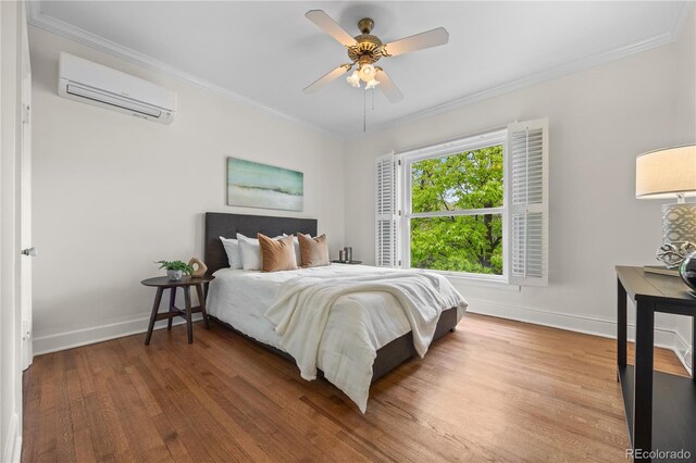 963 N Lafayette St, Denver, CO 80218 - bedroom featuring a wall mounted AC, baseboards, wood finished floors, ornamental molding, and a ceiling fan