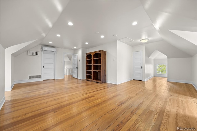 963 N Lafayette St, Denver, CO 80218 - bonus room featuring an AC wall unit, vaulted ceiling, light wood-style flooring, recessed lighting, and baseboards