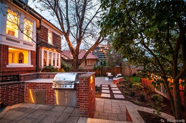 963 N Lafayette St, Denver, CO 80218 - view of patio / terrace with a grill, area for grilling, and a fenced backyard