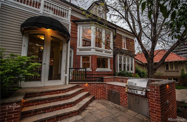 963 N Lafayette St, Denver, CO 80218 - view of patio / terrace with area for grilling and french doors