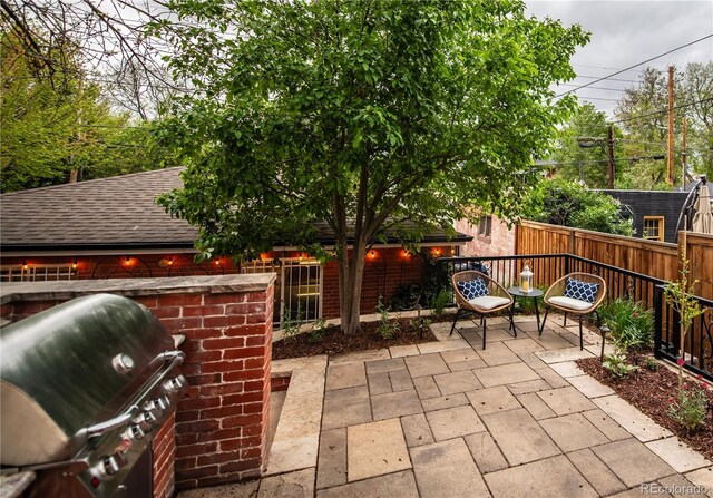 963 N Lafayette St, Denver, CO 80218 - view of patio / terrace with area for grilling and fence