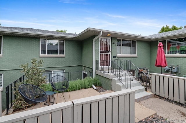 816 Forest St, Denver, CO 80220 - view of exterior entry with brick siding