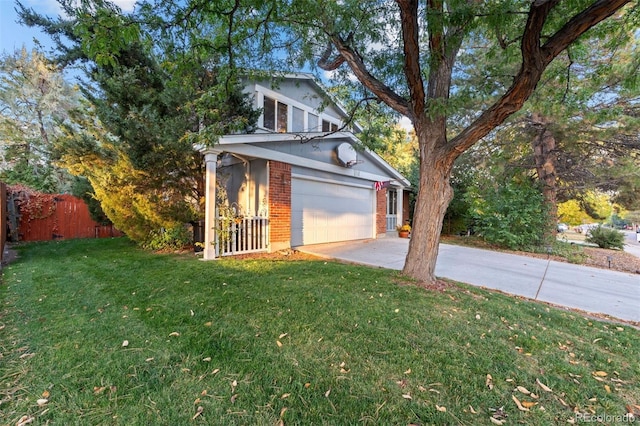 view of home's exterior with a lawn and a garage