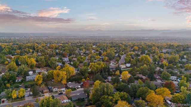 aerial view at dusk with a mountain view