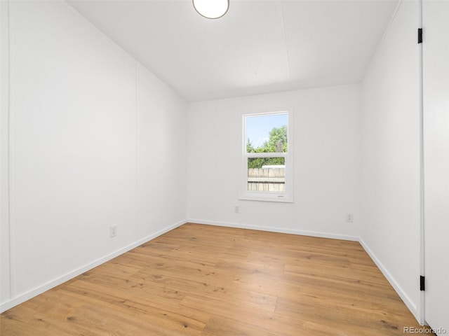 empty room with light wood-type flooring