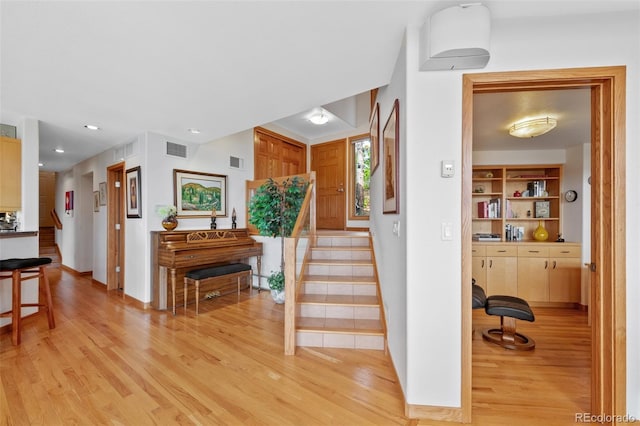 857 Pawnee Trl, Castle Rock, CO 80108 - staircase featuring wood finished floors, baseboards, and built in shelves