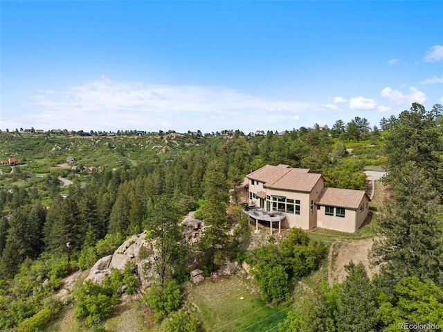 857 Pawnee Trl, Castle Rock, CO 80108 - view from above of property featuring a heavily wooded area