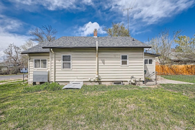 1746 Galena St, Aurora, CO 80010 - view of property exterior with roof with shingles and a chimney