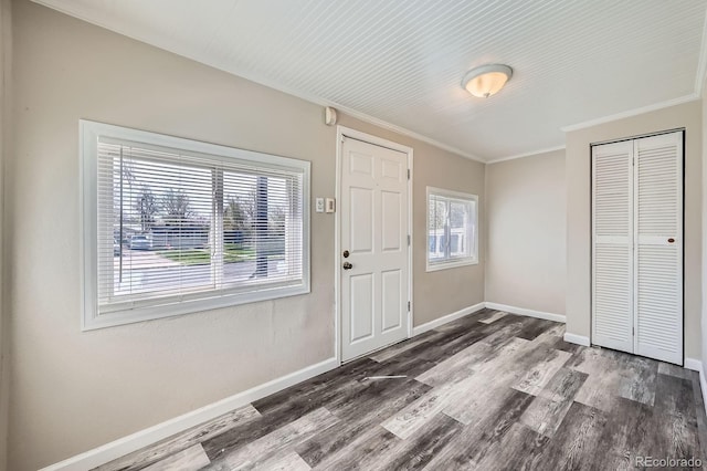 1746 Galena St, Aurora, CO 80010 - foyer with crown molding, wood finished floors, and baseboards