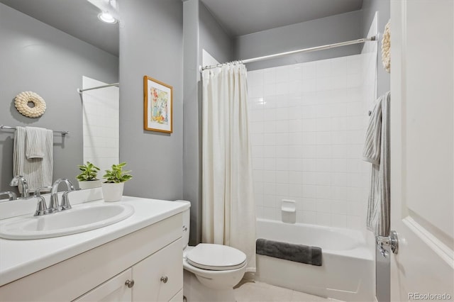 full bath featuring toilet, shower / bath combination with curtain, and vanity