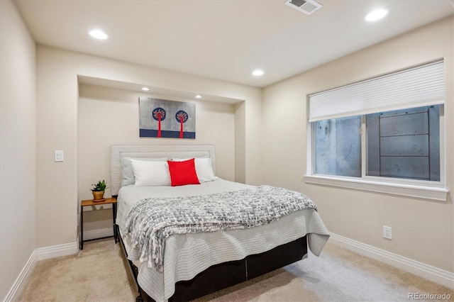 carpeted bedroom with baseboards and recessed lighting