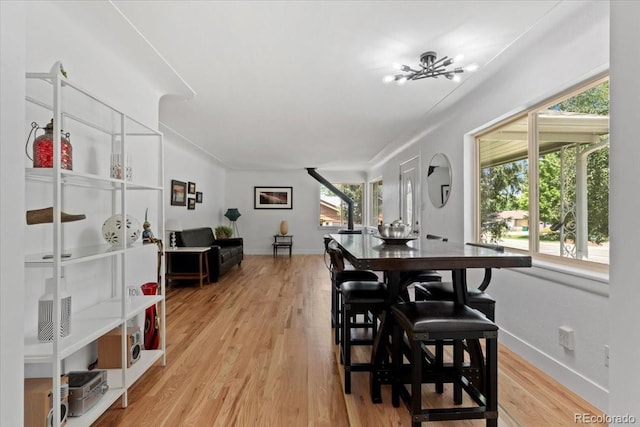 4125 Pierce St, Wheat Ridge, CO 80033 - dining room featuring light wood-style flooring and baseboards