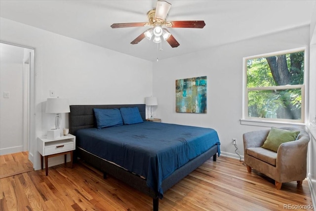 4125 Pierce St, Wheat Ridge, CO 80033 - bedroom featuring light wood finished floors and ceiling fan