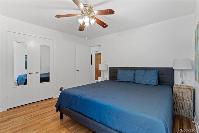 4125 Pierce St, Wheat Ridge, CO 80033 - bedroom featuring light wood finished floors, french doors, and ceiling fan