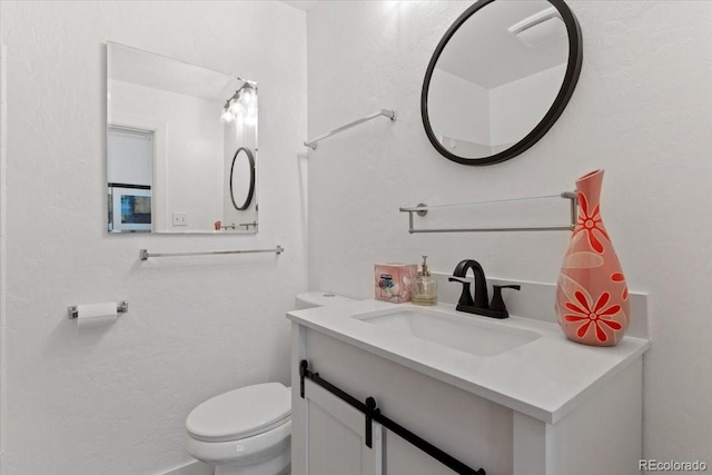 4125 Pierce St, Wheat Ridge, CO 80033 - half bath featuring toilet and vanity