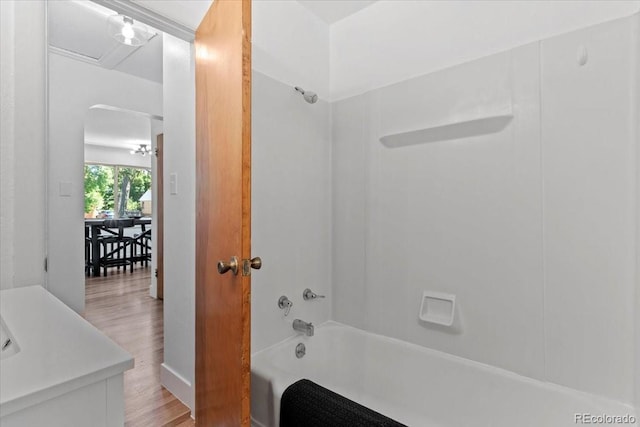 4125 Pierce St, Wheat Ridge, CO 80033 - full bath with  shower combination, wood finished floors, and vanity