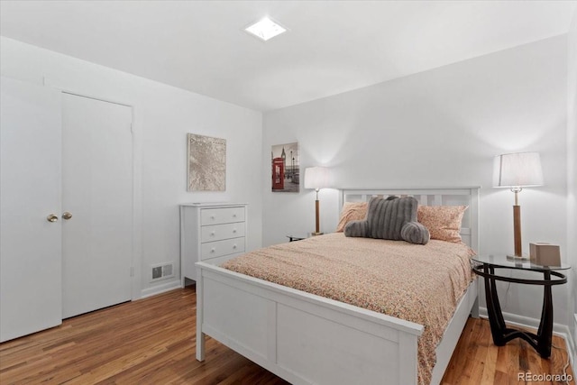 4125 Pierce St, Wheat Ridge, CO 80033 - bedroom featuring wood finished floors