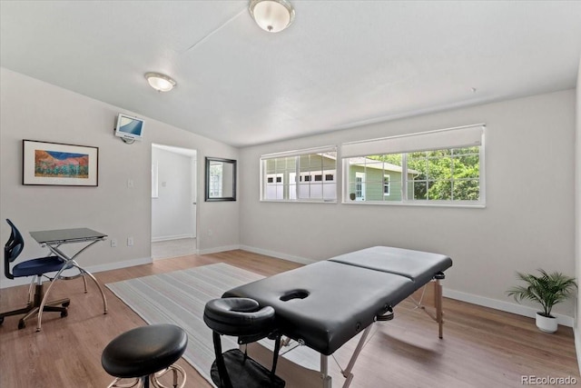 4125 Pierce St, Wheat Ridge, CO 80033 - game room with light wood-style flooring and lofted ceiling