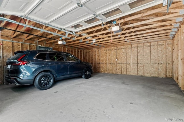 4125 Pierce St, Wheat Ridge, CO 80033 - garage featuring a garage door opener