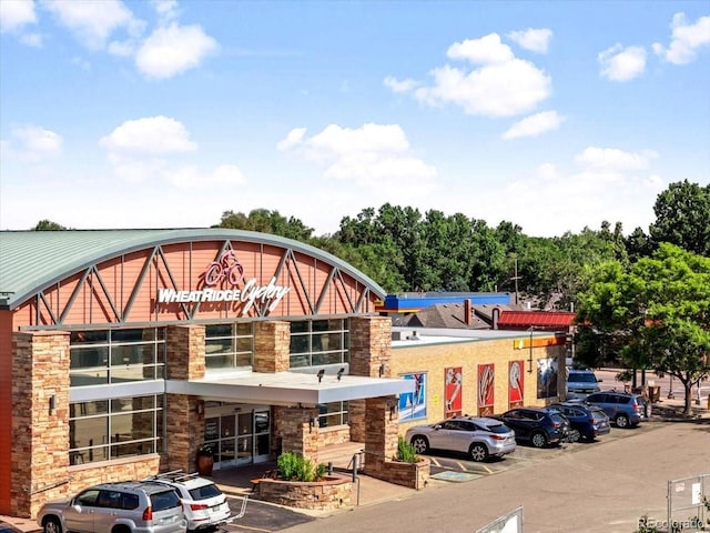 4125 Pierce St, Wheat Ridge, CO 80033 - view of commercial property featuring uncovered parking