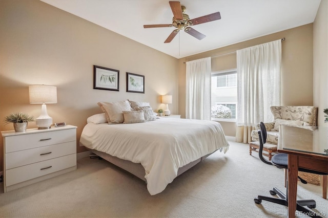 3847 Mossy Rock Dr Unit 104, Highlands Ranch, CO 80126 - bedroom with light colored carpet, a ceiling fan, and baseboards